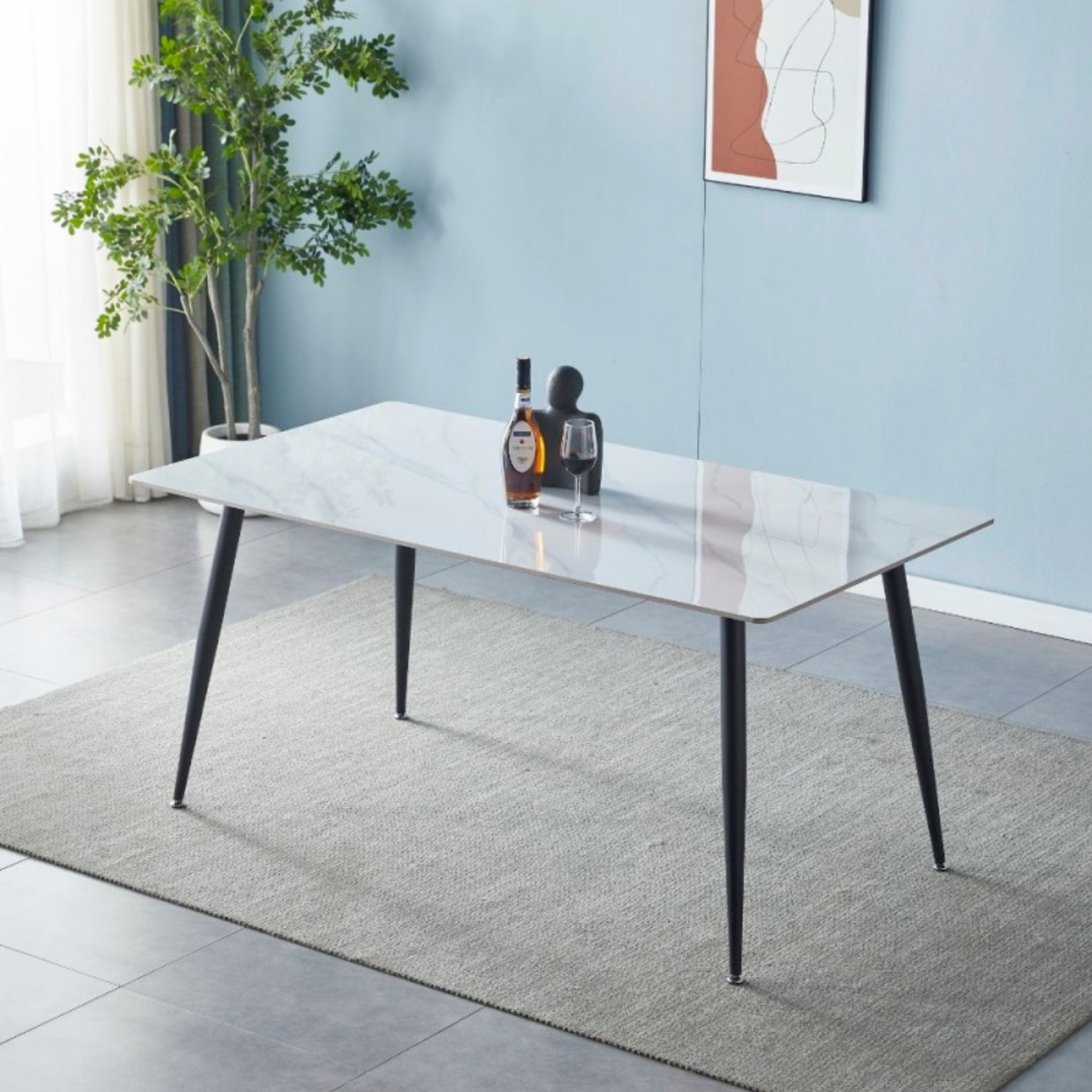 Tavolo da pranzo rettangolare "Mila" top in ceramica effetto marmo e gambe in metallo 140x80
