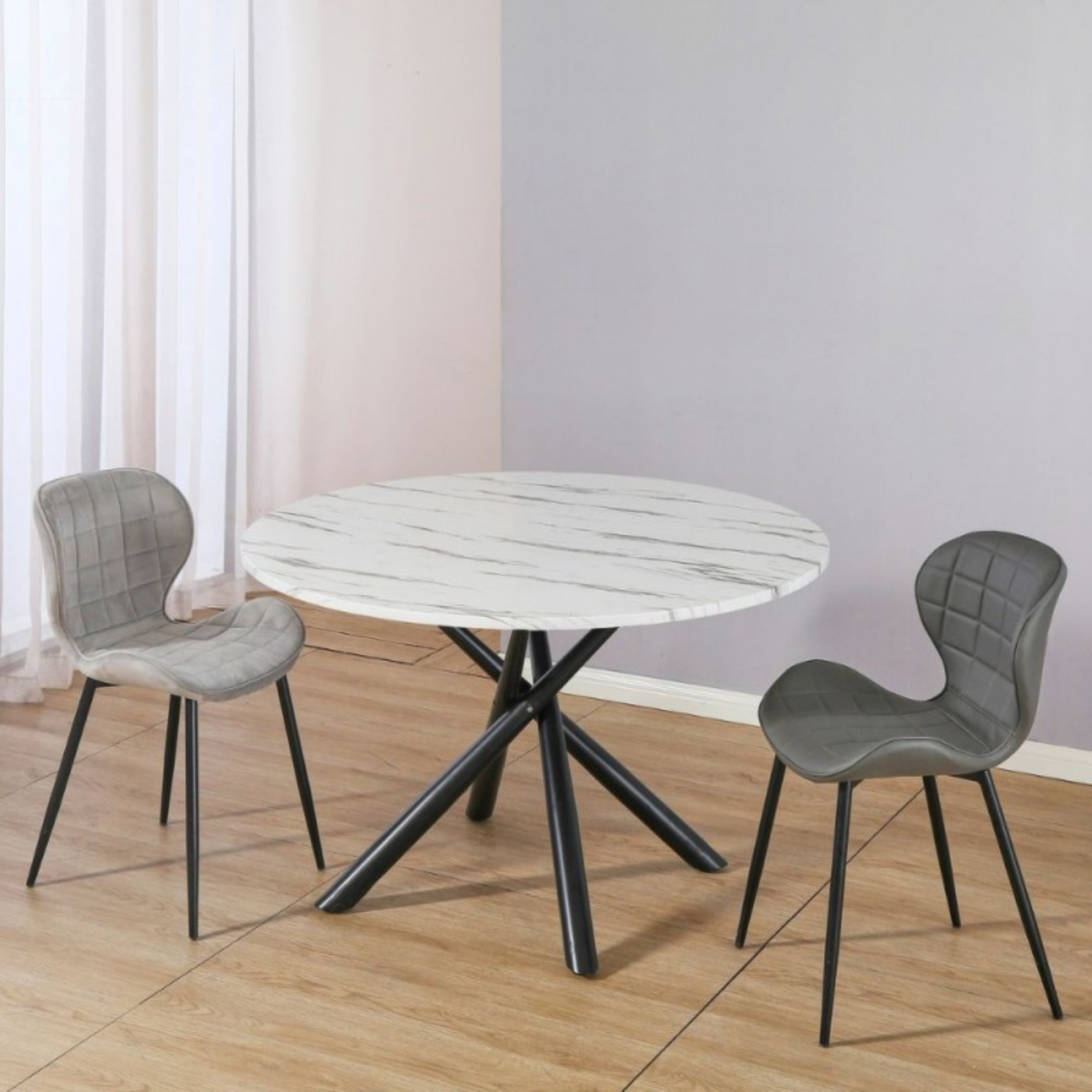 Tavolo da pranzo rotondo piano in ceramica effetto marmo bianco gambe in metallo nero - Ubri